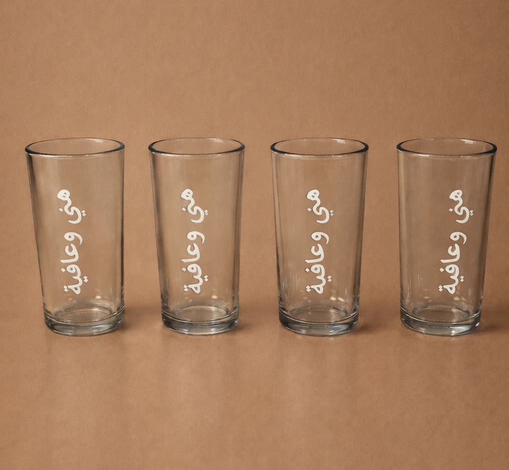 طقم اكواب زجاج ٤ حبات بعبارة ( ماء / لبن / عصير / فيمتو/ هني وعافية)