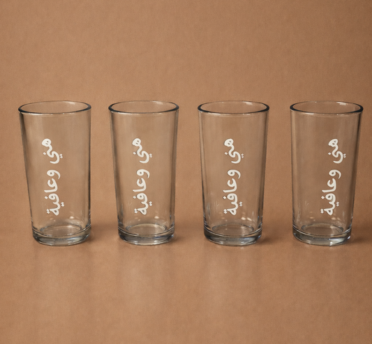 طقم اكواب زجاج ٤ حبات بعبارة ( ماء / لبن / عصير / فيمتو/ هني وعافية)